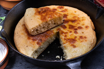 Mexican cornbread cooked in cast iron skillet