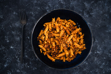 plant-based food, vegan fusilli pasta with lentil sauce