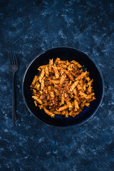 plant-based food, vegan fusilli pasta with lentil sauce