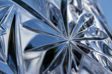 Macro abstract view of beautiful lead crystal glass texture with star burst pattern design