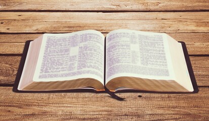 Obraz premium Open vintage christian bible on wooden desk