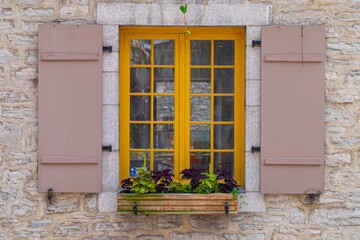 Fototapeta na wymiar Close up of shutter window with flower decoration