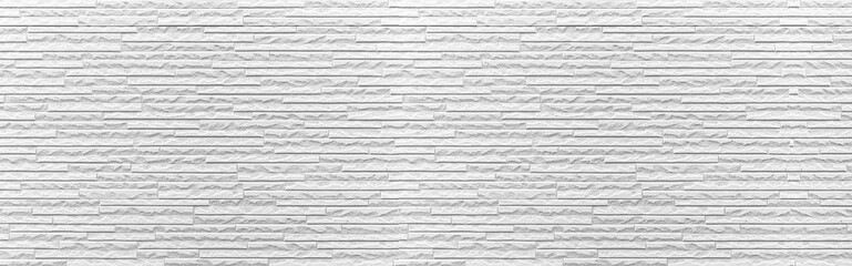 Panorama of white modern stone wall pattern and background seamless