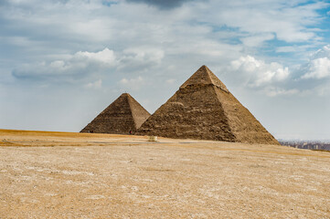 Fototapeta na wymiar It's Pyramid of Khafre (Pyramid of Chephren) and Pyramid of Cheops, Giza Necropolis, Egypt