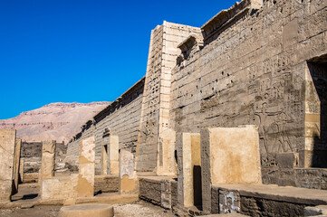 It's Wall of the Medinet Habu (Mortuary Temple of Ramesses III), West Bank of Luxor in Egypt.