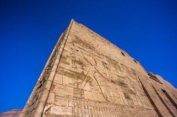 It's Wall of the Medinet Habu (Mortuary Temple of Ramesses III), West Bank of Luxor in Egypt.