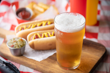 hot dog with beer and french fries