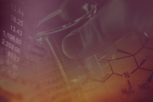 Laboratory glass on a hand. Science concept.