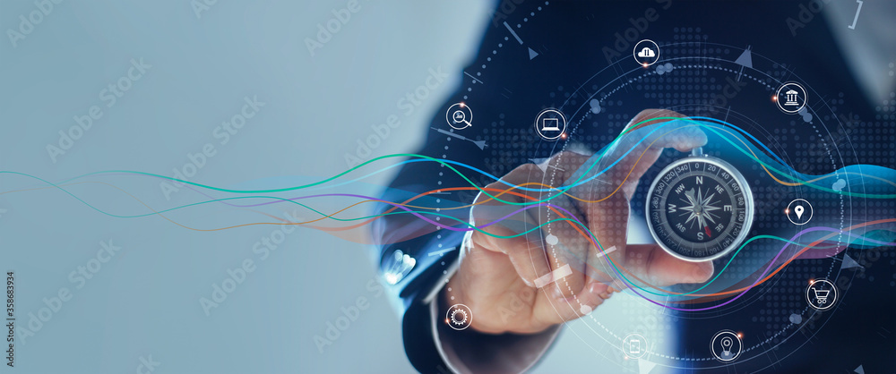 Poster businessman with a compass holding in hand. define marketing direction and search customer global ne