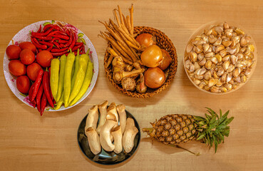 The ingredients for Thai cuisine; Onions,Galangals, Fingerroots (Chinese's Ginger), Red chili spur...