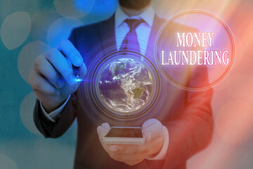 Word writing text Money Laundering. Business photo showcasing illegal process hiding origin of...