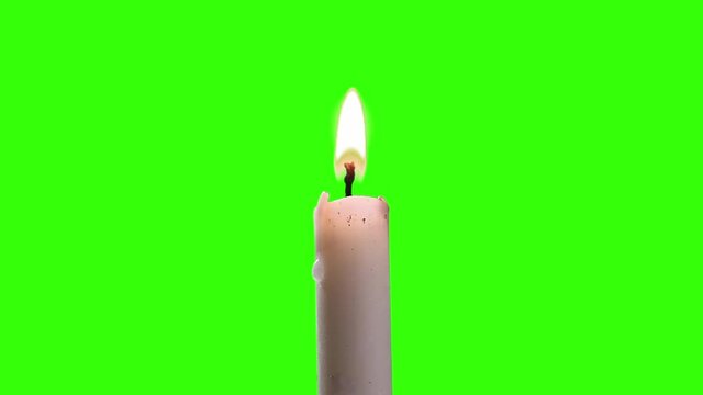 Candle on Green Screen. Close-Up. You can replace green screen with the footage or picture you want. You can do it with “Keying” effect in After Effects.
