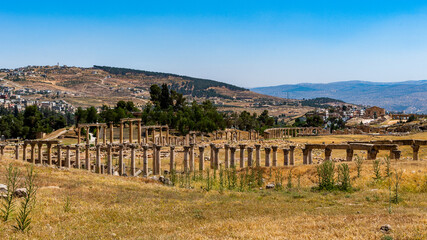 Fototapeta na wymiar It's Columns raw of the Cardo Maximus Ancient Roman city of Gerasa of Antiquity , modern Jerash, Jordan