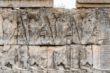It's Ancient stone relief in Persepolis, the ceremonial capital of the Achaemenid Empire. UNESCO World Heritage