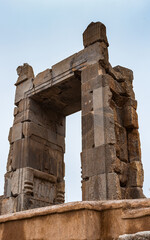 Fototapeta na wymiar It's Gate into the 100 colums hall in the ancient city of Persepolis, Iran. UNESCO World heritage site