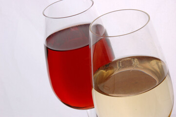 Wine Glasses containing red and white wine