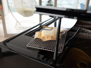 Cheesecake with Patula on top of Piano