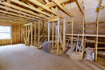 House attic under construction interior inside a frame walls beam built home under construction