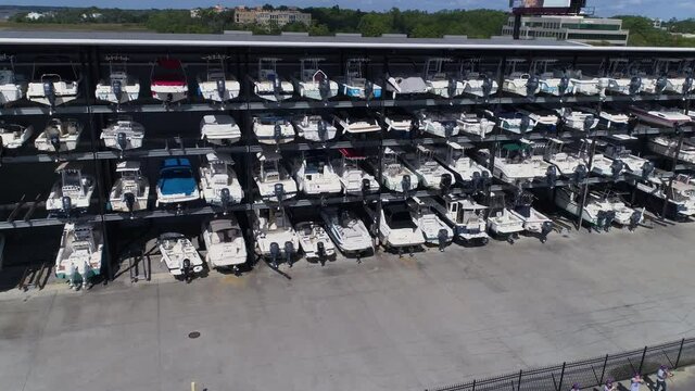 Aerial Circle Shot Wide Angle of Boats on Racks at Dry Stack Marina