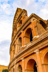 Fototapeta premium It's Colosseum or Coliseum in the evening, Rome, Italy. One of the main touristic destinations in Rome