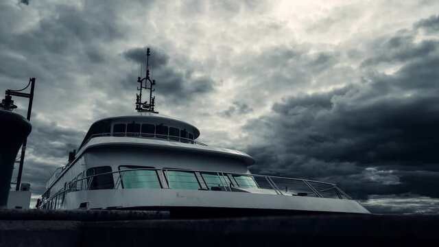 Thunderstorm And Dramatic Clouds Over The Lake Memphremagog With A Tourist Boat Anchored In Wharf In Magog, Quebec, Canada. - timelapse