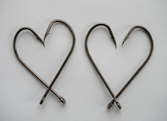 Big fishing hooks in the shape of hearts