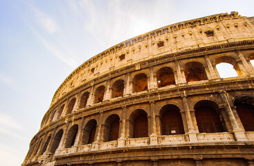 Fototapeta na wymiar Exterior of the Colosseum or Coliseum, an elliptical amphitheatre in the centre of the city of Rome, Italy