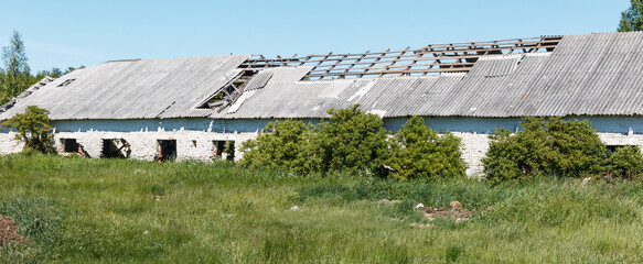 Damaged asbestos roofing material. Roof covering material with asbestos fiber