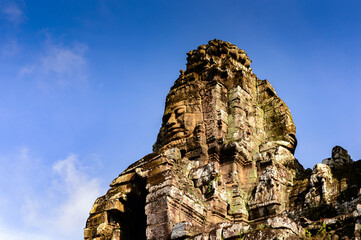 It's Bayon, Khmer temple at Angkor in Cambodia. Official state temple of the Mahayana Buddhist King...
