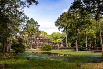Fototapeta na wymiar It's Baphuon, a temple at Angkor, Cambodia. Built as the state temple of Udayadityavarman II dedicated to the Hindu God Shiva.