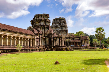Fototapeta na wymiar It's Angkor Wat (Temple City), a Buddhist, temple complex in Cambodia and the largest religious monument in the world. View from the garden