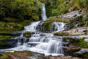 Fototapeta na wymiar A long exposure of the The McLeans falls in the Catlins Forest Park Otago New Zealand