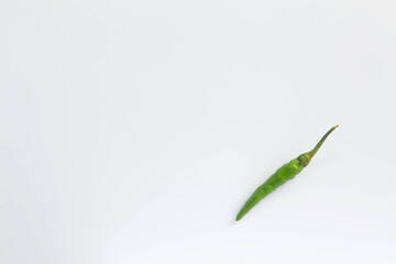 Green chili peppers on white background,