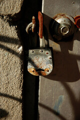 Wooden door with bolt and padlock