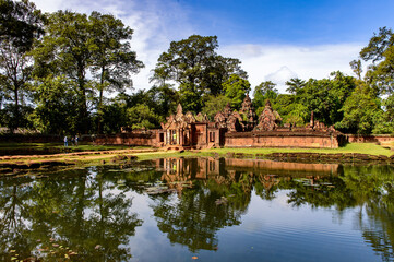 It's Banteay Srei or Banteay Srey , a 10th-century Cambodian temple dedicated to the Hindu god Shiva.