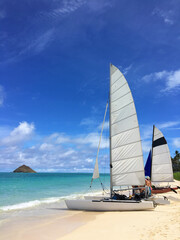 Two sailboats at Lanikai beach in Kailua, Oahu Island, Hawaii