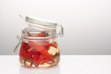 pickled chilean peppers in a jar