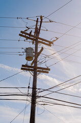Evening Sunlight On Electrical Service Poles