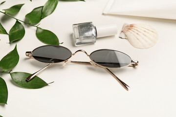 Stylish sunglasses on white background