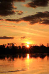 Colorful sunset by the Odra River, Poland.