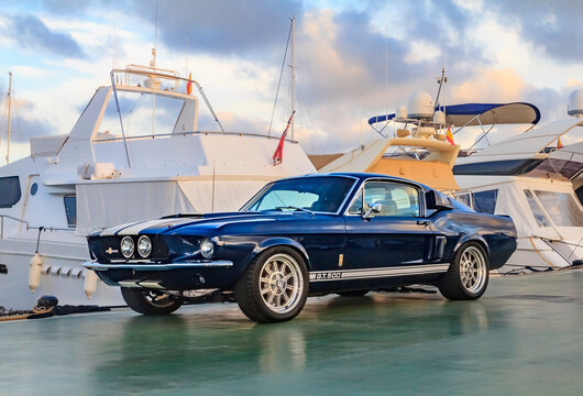 Palma de Mallorca, Spain - October 24, 2013: Classic rare American muscle car, vintage blue Ford  Mustang Shelby Cobra GT-500 Fastback on a pier in Mallorca
