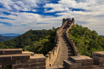 Tourists walking on the Great Wall of China, in the Mutianyu village, one of remote parts of the Great Wall near Beijing