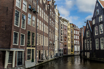 Fototapeta na wymiar Amsterdam buildings on water