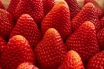 Strawberry fruit closeup background. Macro image