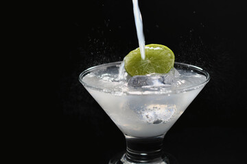 cocktail with ice and lime