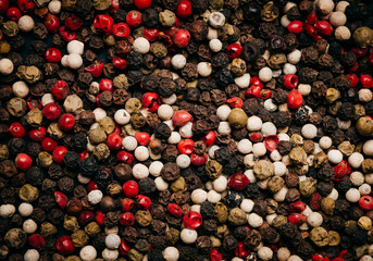 Collection of peppercorn in black background