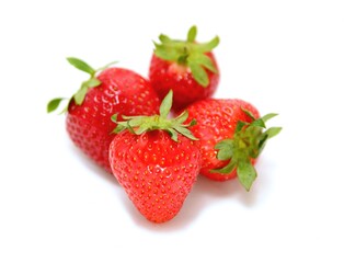 Group of strawberries over white background.