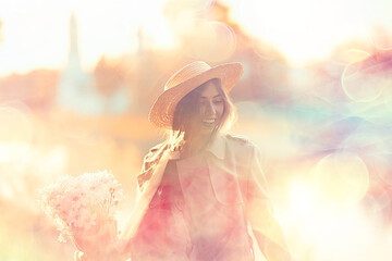 girl in a straw hat portrait spring freedom / concept spring view model happy people