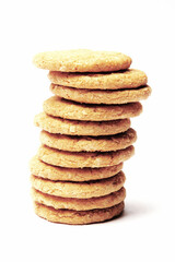 Stack of chip cookies against white background