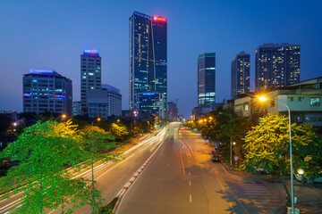 Fototapeta na wymiar Hanoi cityscape with modern buildings on Nguyen Chi Thanh street at twilight
